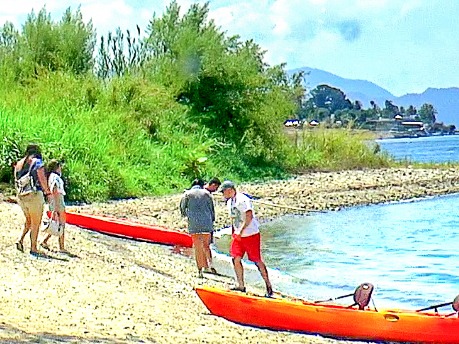 kayaks, people on beach